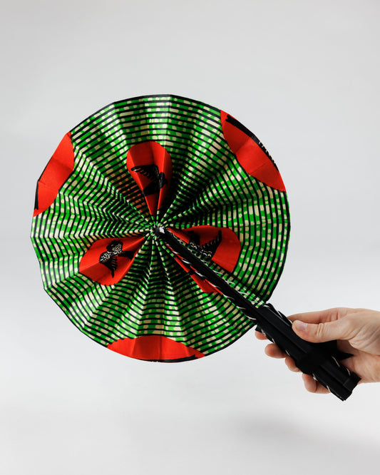 Fan- Collapses for easy storage, made from African wax fabric