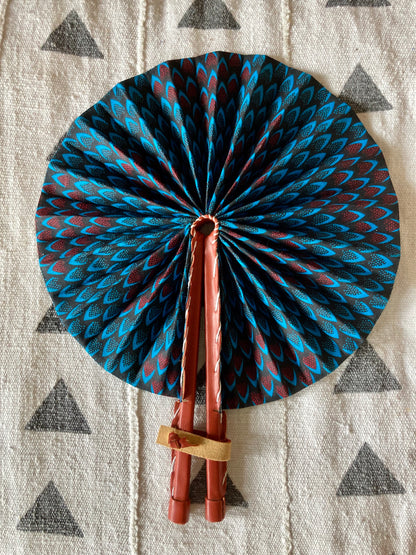 Fan- Collapses for easy storage, made from African wax fabric