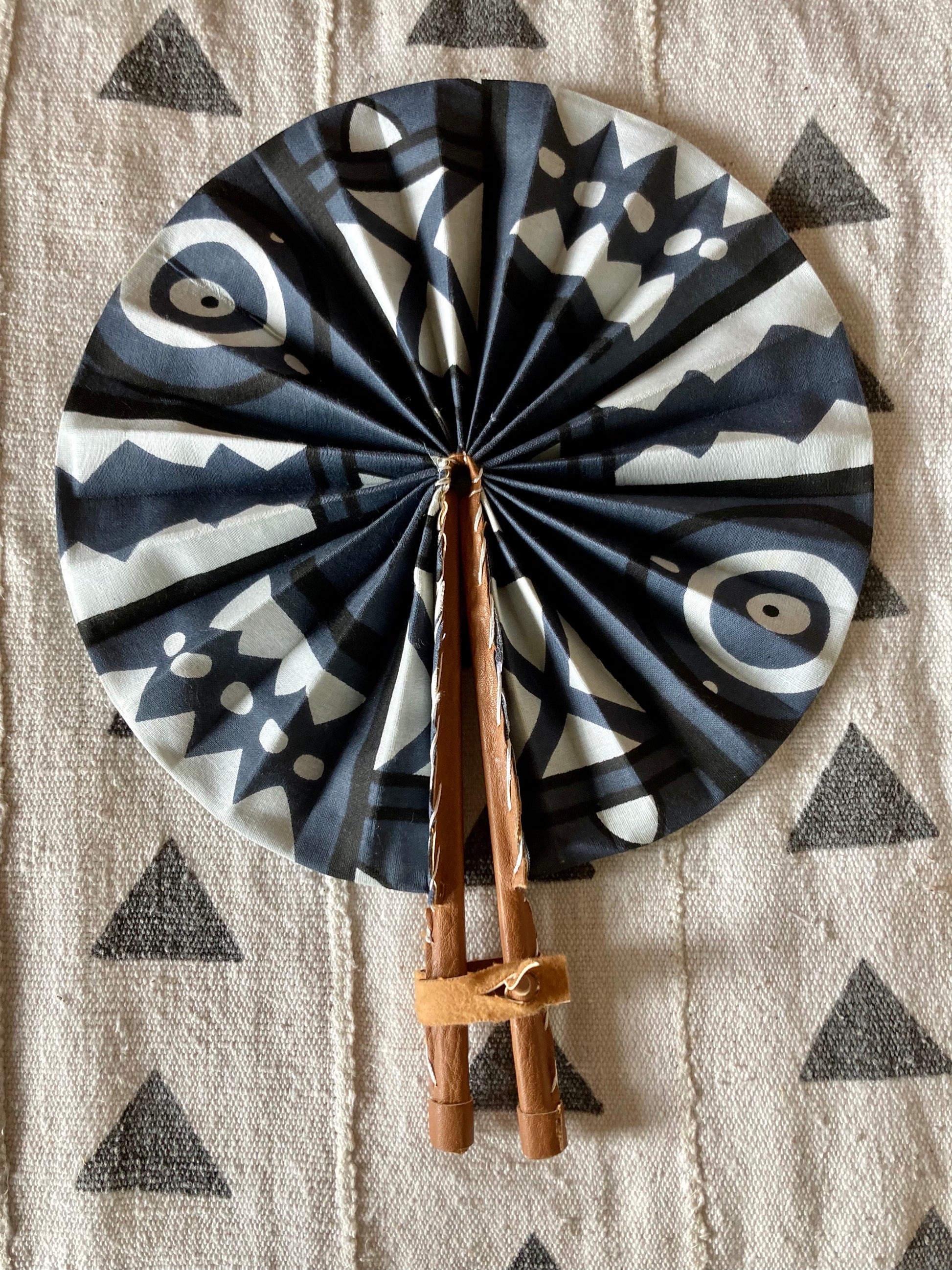 Fan - folds up for convenient storage, made out of African wax fabric